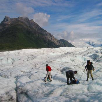 Backpackers on Root glacier in Wrangell St. Elias National Park