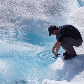 Glacier melt pool on Root Glacier in Wrangell St. Elias Park