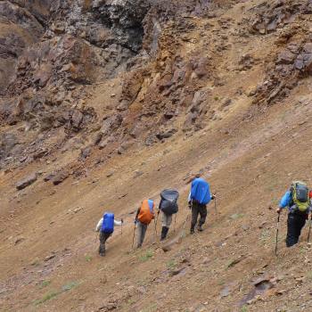 Traversing scree slopes on the Goat Trail, Wrangell St. Elias National Park, Alaska